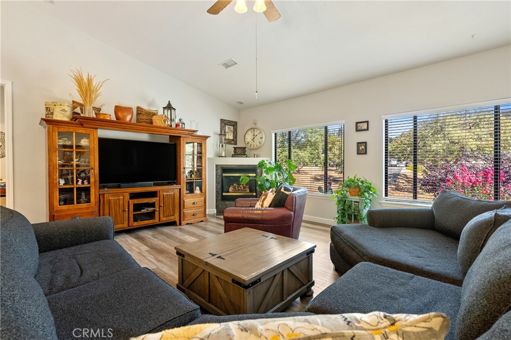 11625 Cenegal Road Atascadero, CA 93422 - Photo 8 of 65 Natural light is ushered into the living room through the large picture windows.