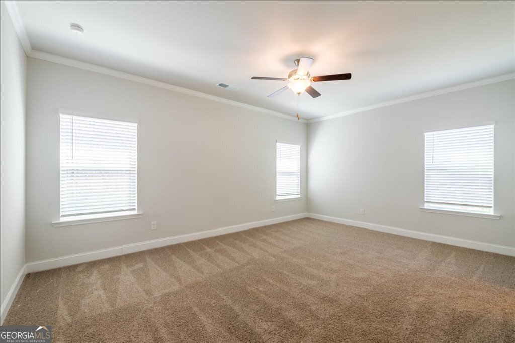 361 Eagle Ridge Road Macon, GA 31216 - Photo 23 of 50 a view of an empty room with a window