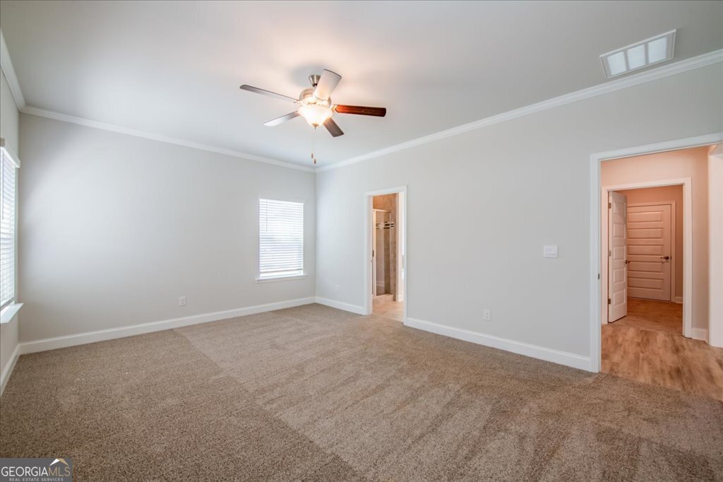 361 Eagle Ridge Road Macon, GA 31216 - Photo 24 of 50 a view of an empty room with a window