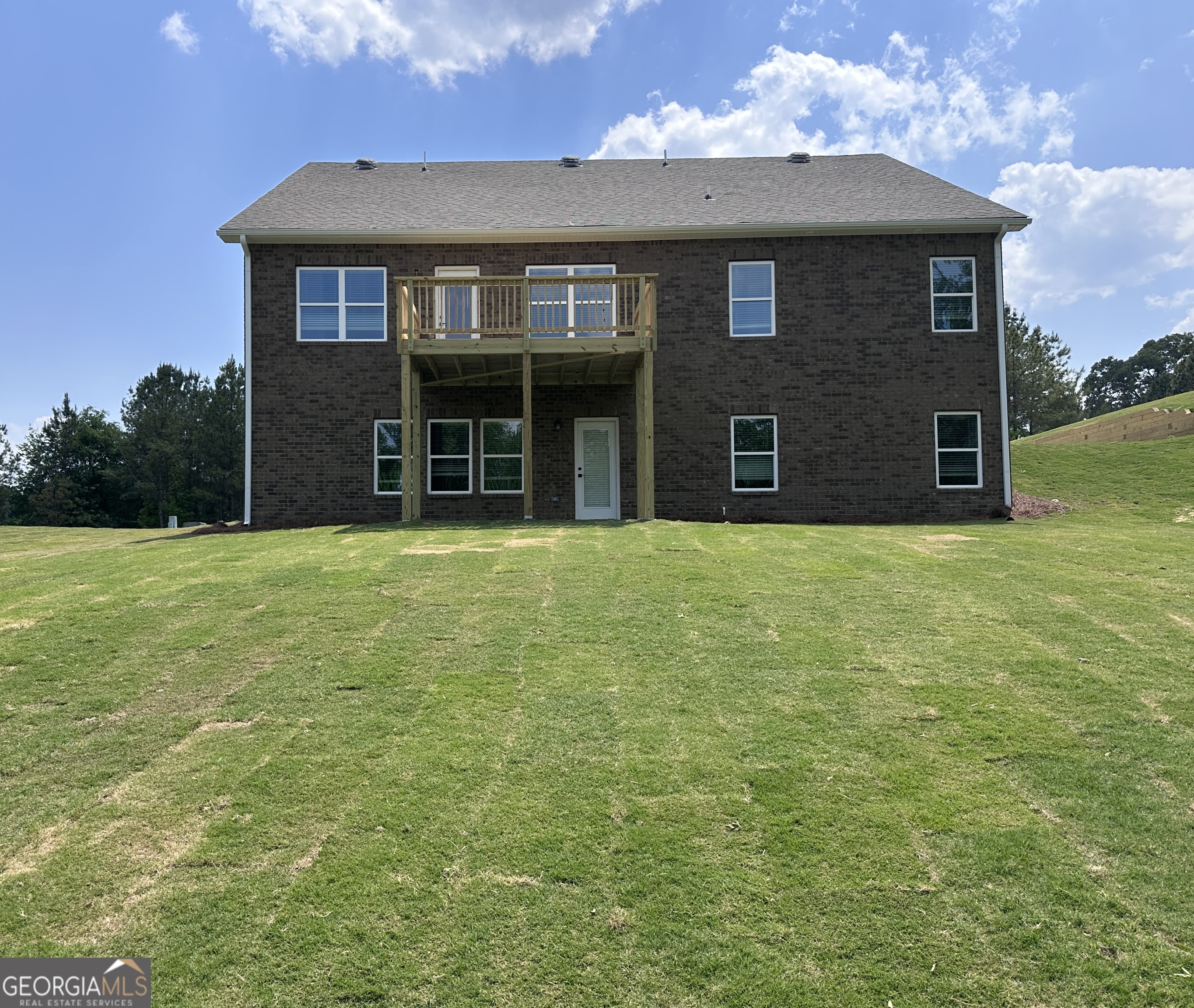 361 Eagle Ridge Road Macon, GA 31216 - Photo 3 of 50 a brick house with a yard