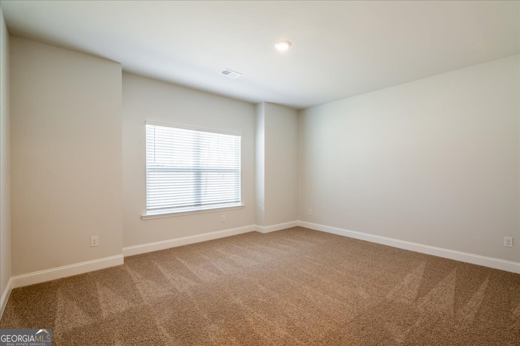 361 Eagle Ridge Road Macon, GA 31216 - Photo 36 of 50 an empty room with a window