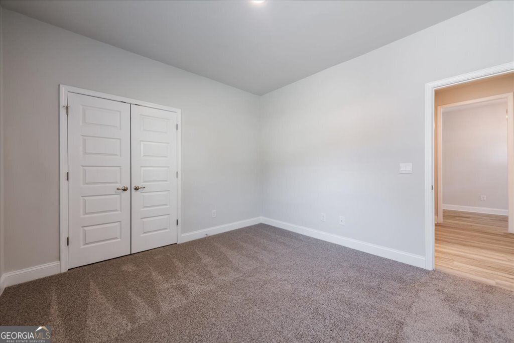 361 Eagle Ridge Road Macon, GA 31216 - Photo 42 of 50 an empty room with closet area