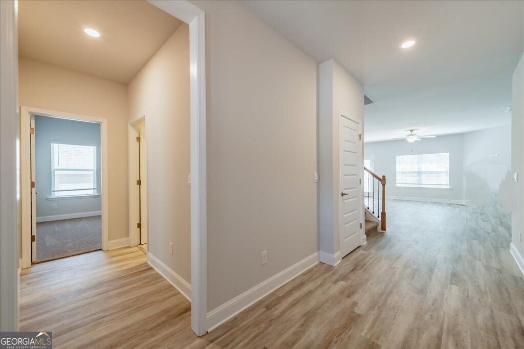 361 Eagle Ridge Road Macon, GA 31216 - Photo 5 of 50 a view of a hallway with wooden floor