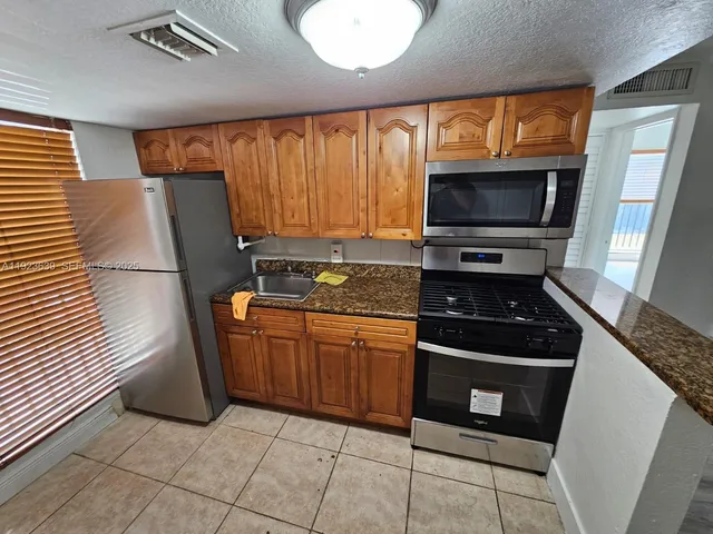 $2,100 | 241 South Royal Poinciana Boulevard, Unit 202, Miami Springs, FL 33166