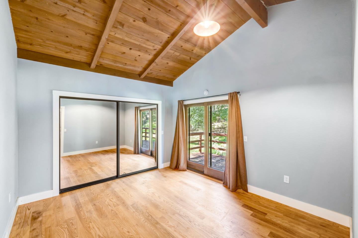 42250 East Carmel Valley Road Greenfield, CA 93927 - Photo 12 of 50 a view of an empty room with a balcony