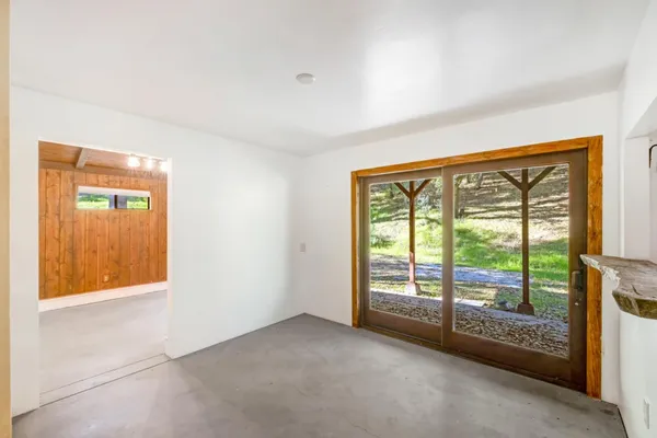 an empty room with windows