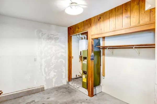 a bathroom with a shower and a sink