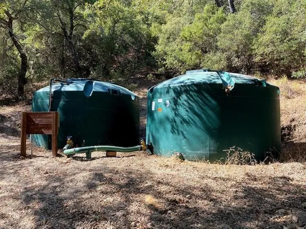 a view of yard with swimming pool