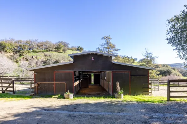 a view of a bench in front of house