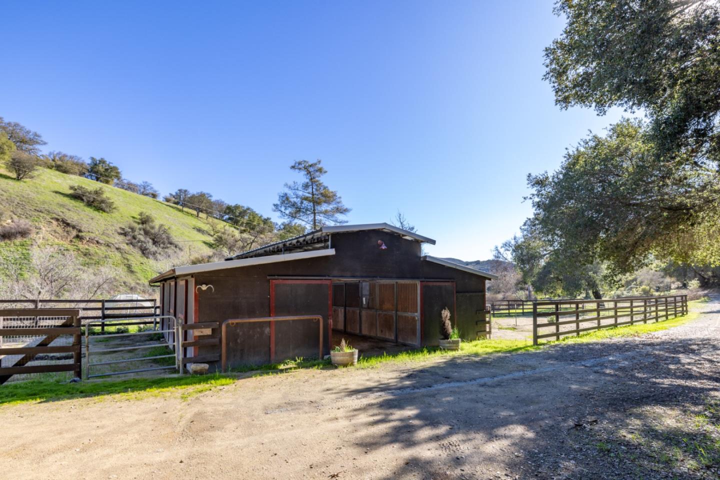 42250 East Carmel Valley Road Greenfield, CA 93927 - Photo 37 of 50 a view of a house with a yard and sitting area