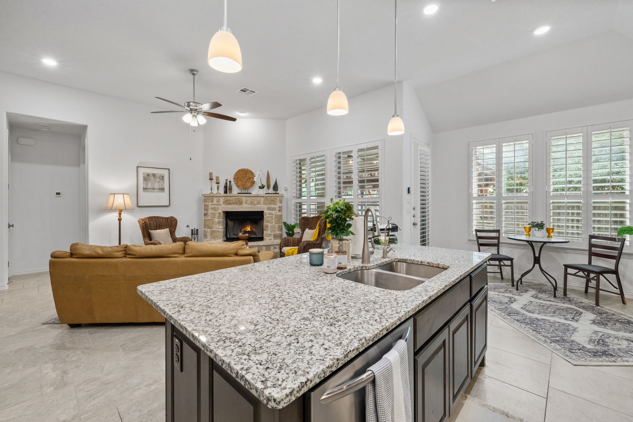 3824 Ashbury Road Round Rock, TX 78681 - Photo 9 of 30 Kitchen island and breakfast nook, overlooking the back yard