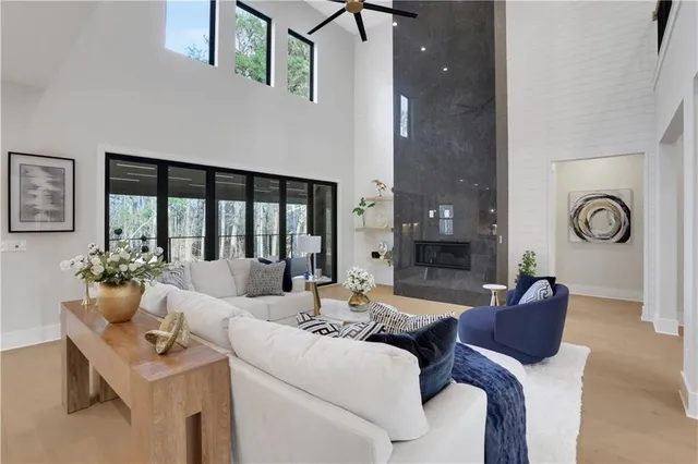a large kitchen with a table and chairs