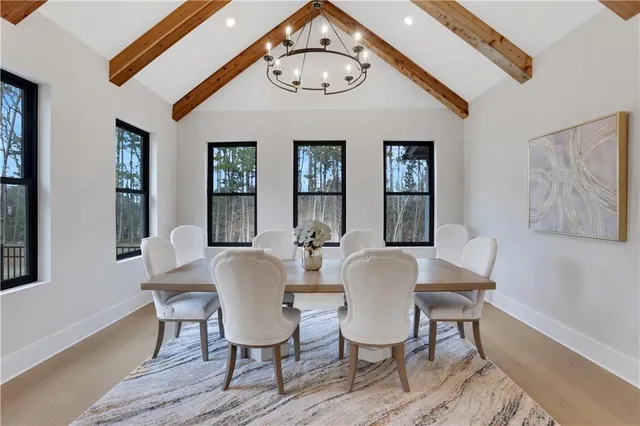 a bathroom with a sink mirror and toilet