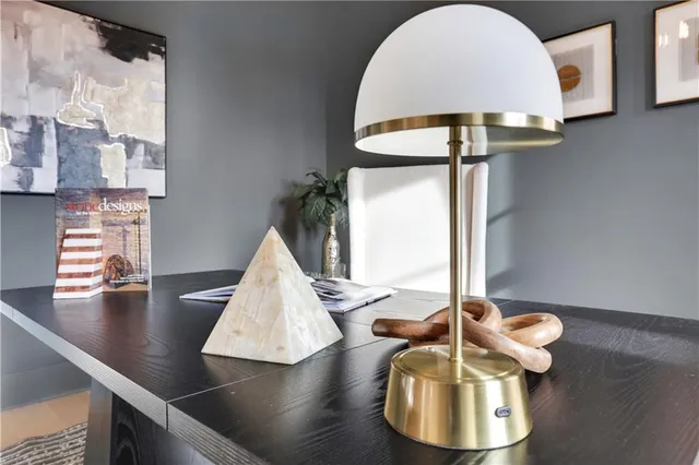 a living room with furniture and a table