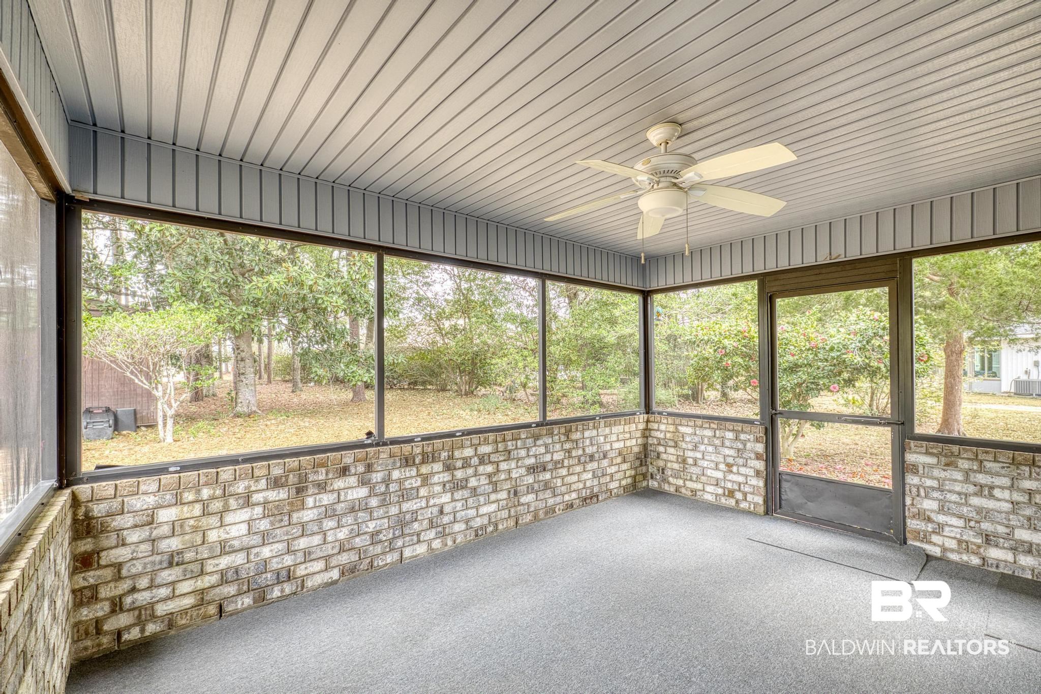 2776 Santa Rosa Circle Lillian, AL 36549 - Photo 28 of 48 Unfurnished sunroom with a ceiling fan and healthy amount of natural light
