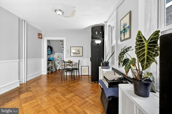 a kitchen with stainless steel appliances kitchen island granite countertop a refrigerator and a stove