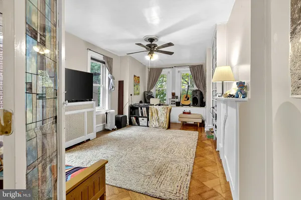 a bedroom with a bed furniture and a window