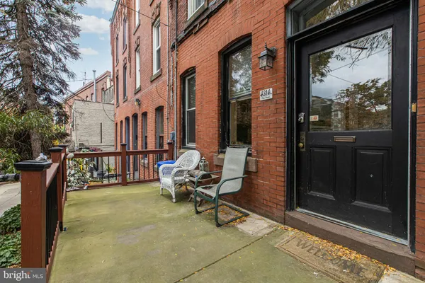 a building outdoor space with patio furniture