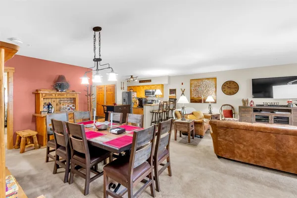 a view of a dining room with furniture