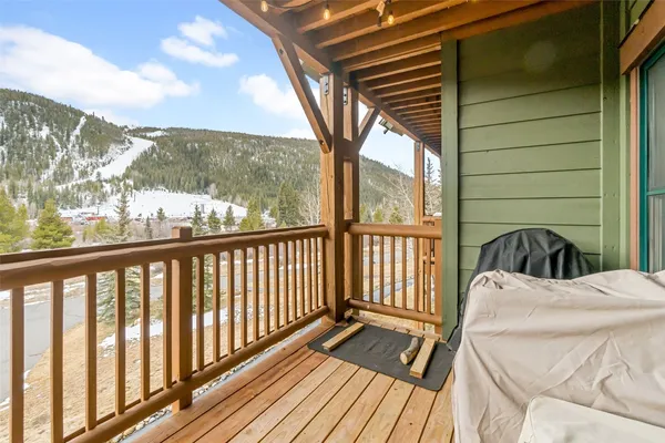a view of a balcony with a bed