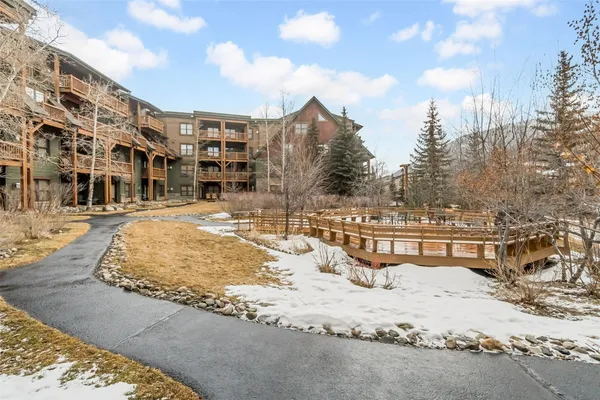 a view of a swimming pool with a lounge chairs