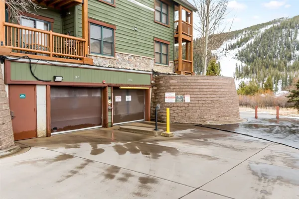 a view of snow on the side of a road
