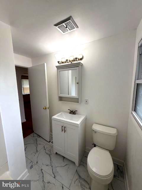 321 Bondsville Road Downingtown, PA 19335 - Photo 12 of 19 a bathroom with a toilet sink and mirror