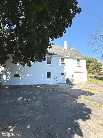 a view of backyard of a house