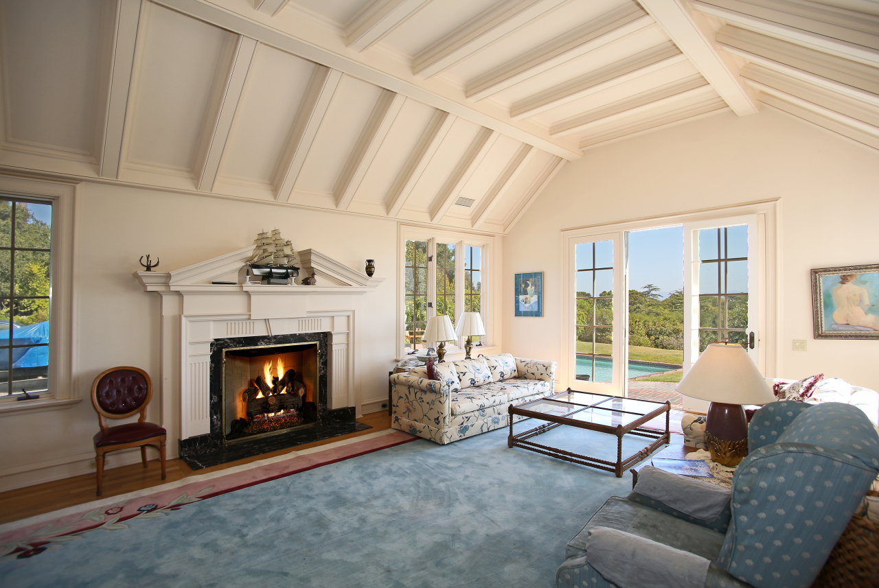Undisclosed Address Hope Ranch, CA 93110 - Photo 5 of 17 a living room with furniture and a fireplace