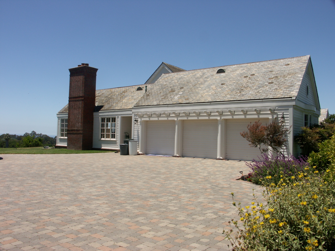 Undisclosed Address Hope Ranch, CA 93110 - Photo 10 of 17 front view of a house with a yard