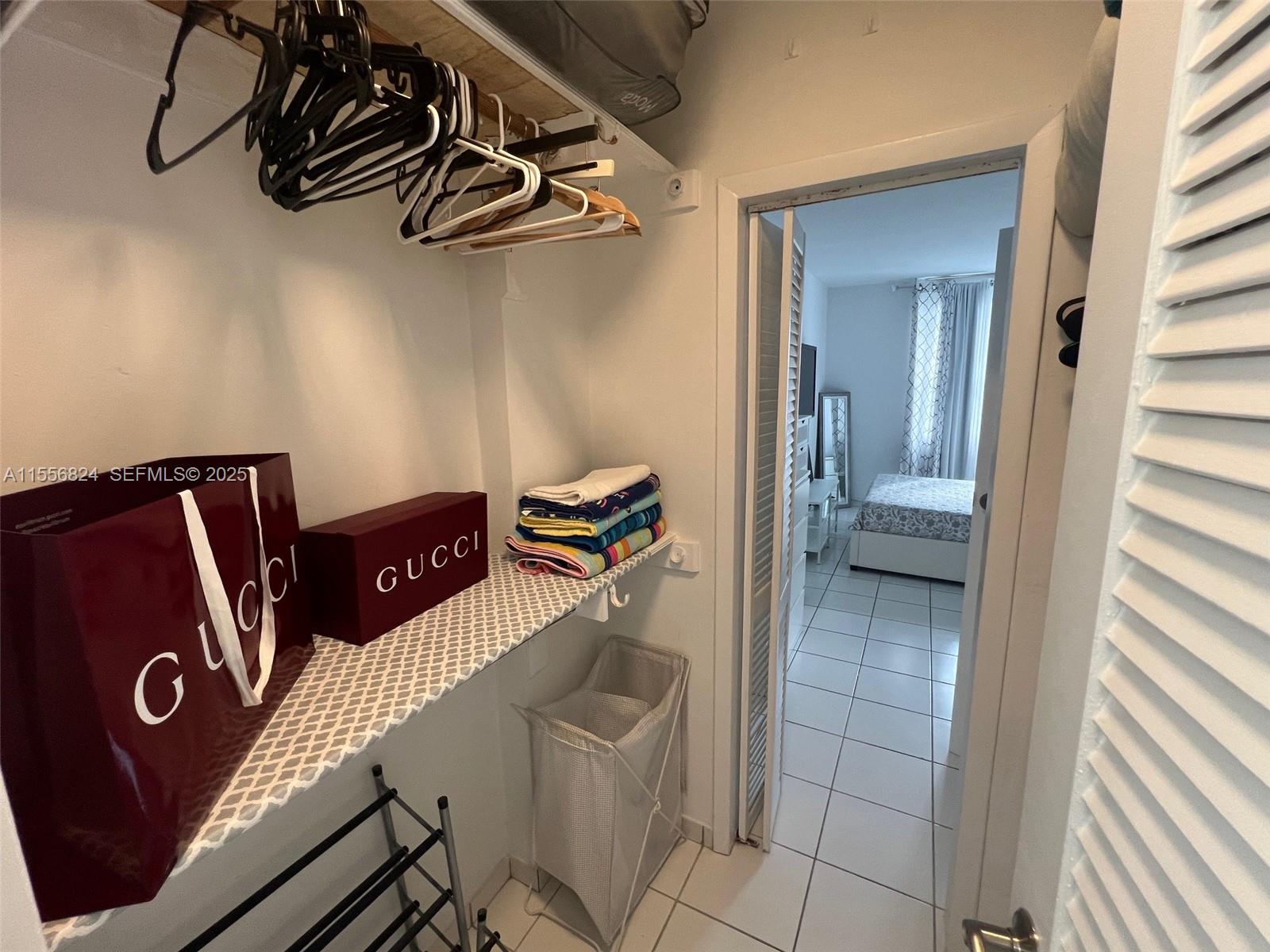 100 Lincoln Road, Unit 1126 Miami Beach, FL 33139 - Photo 18 of 52 a view of walk in closet