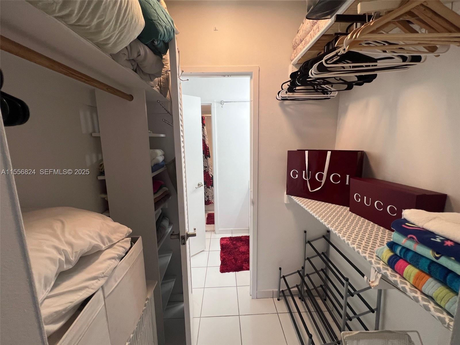 100 Lincoln Road, Unit 1126 Miami Beach, FL 33139 - Photo 19 of 52 a utility room with dryer and washer