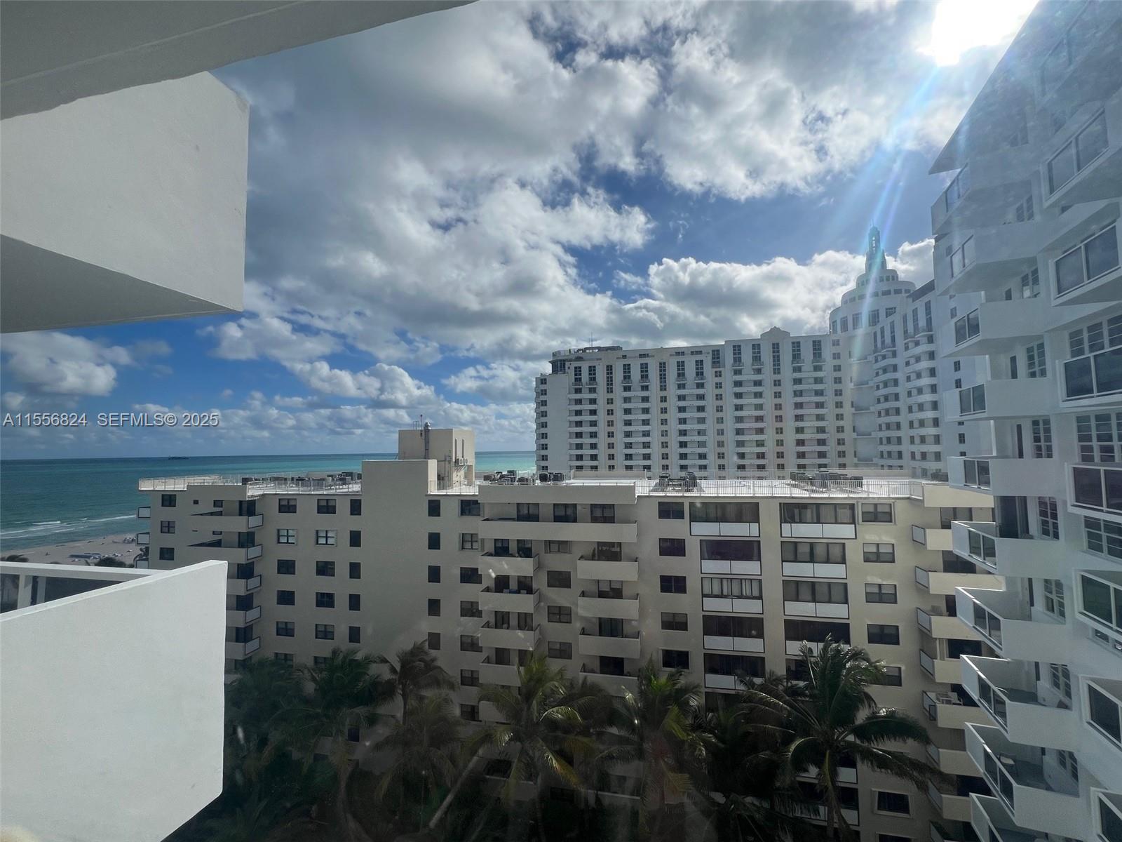 100 Lincoln Road, Unit 1126 Miami Beach, FL 33139 - Photo 50 of 52 a bathroom with a blue shower