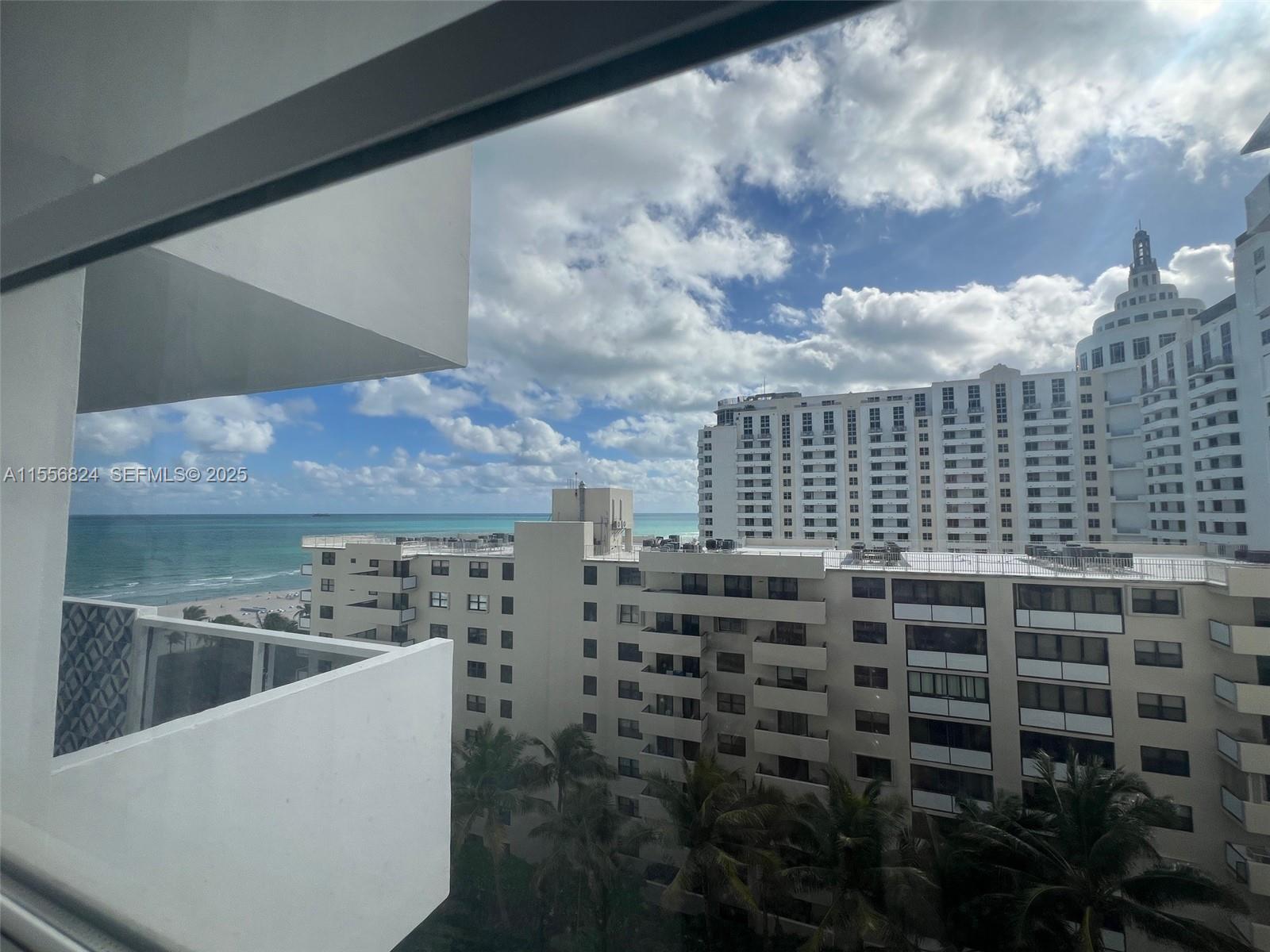 100 Lincoln Road, Unit 1126 Miami Beach, FL 33139 - Photo 51 of 52 a kitchen with cabinets and a stove
