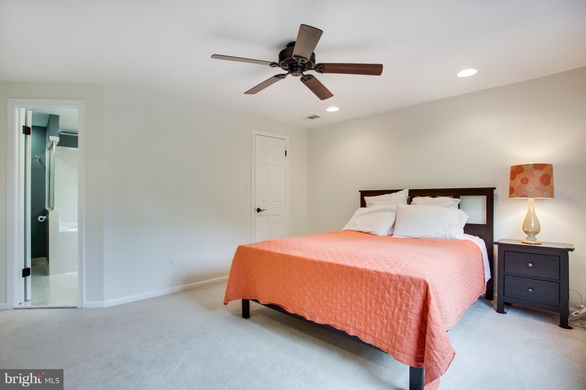 1511 Deer Point Way Reston, VA 20194 - Photo 17 of 30 a bedroom with a bed and window