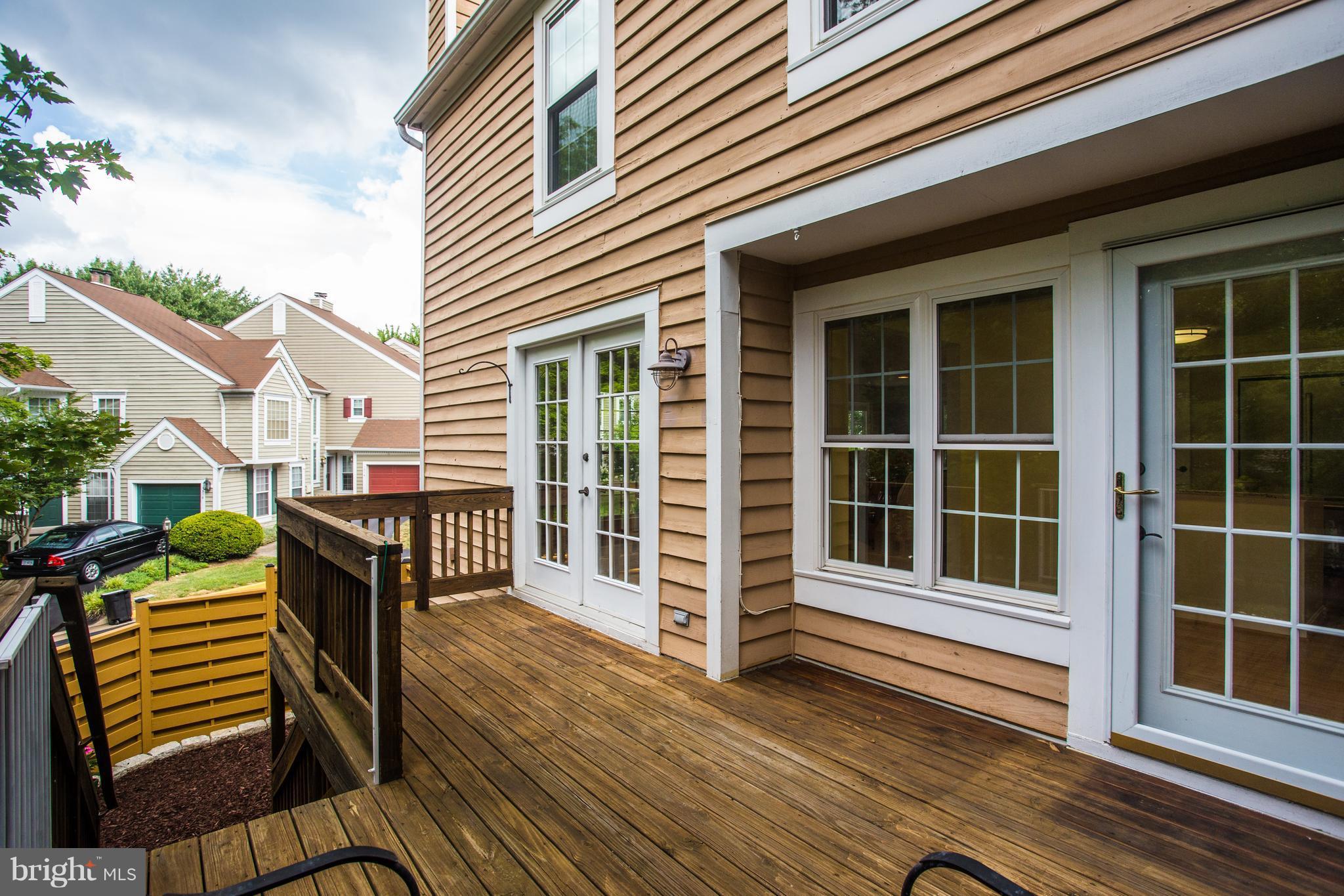 1511 Deer Point Way Reston, VA 20194 - Photo 25 of 30 a view of a house with a large window