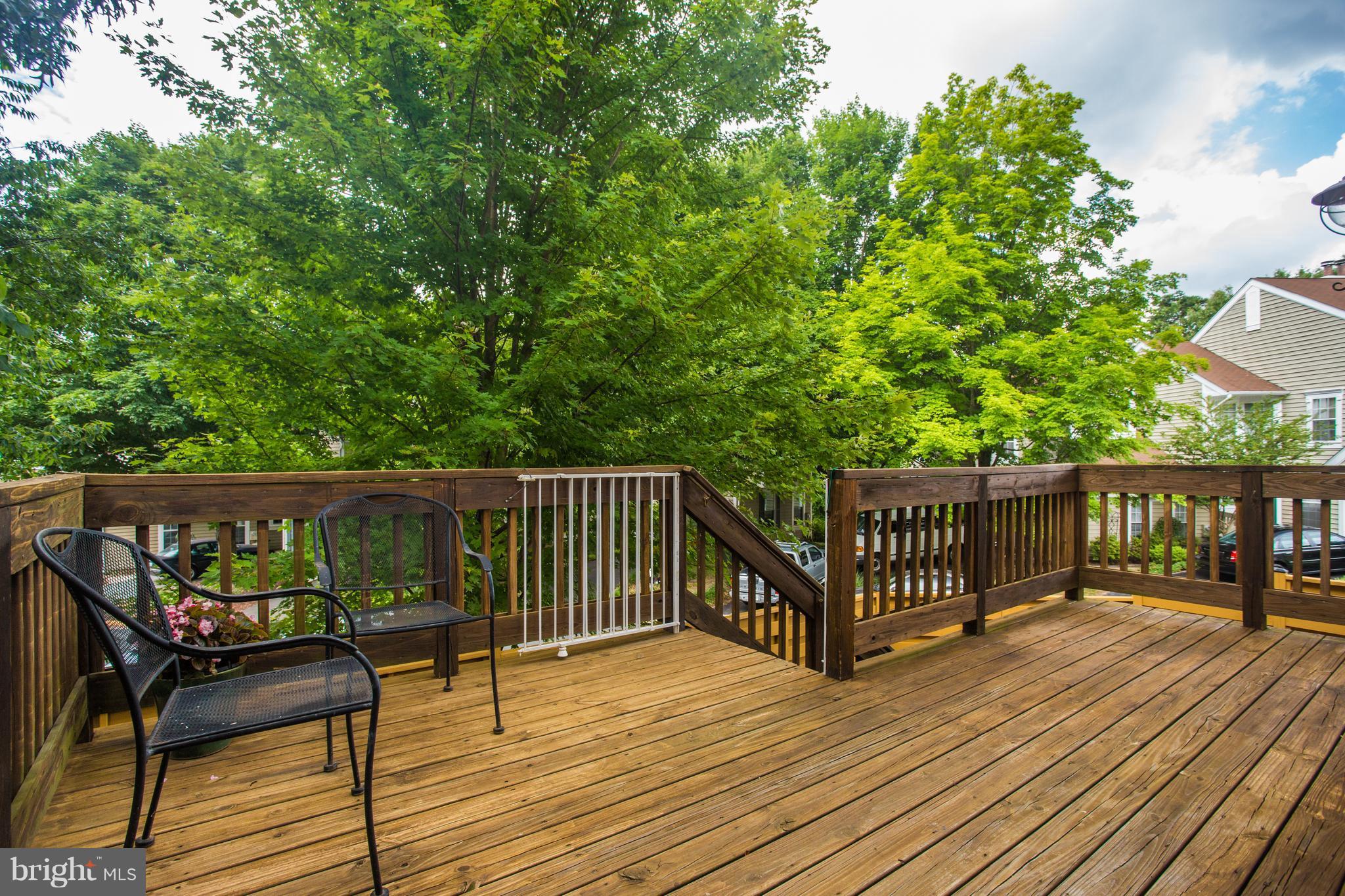 1511 Deer Point Way Reston, VA 20194 - Photo 26 of 30 a view of balcony with wooden floor and seating space