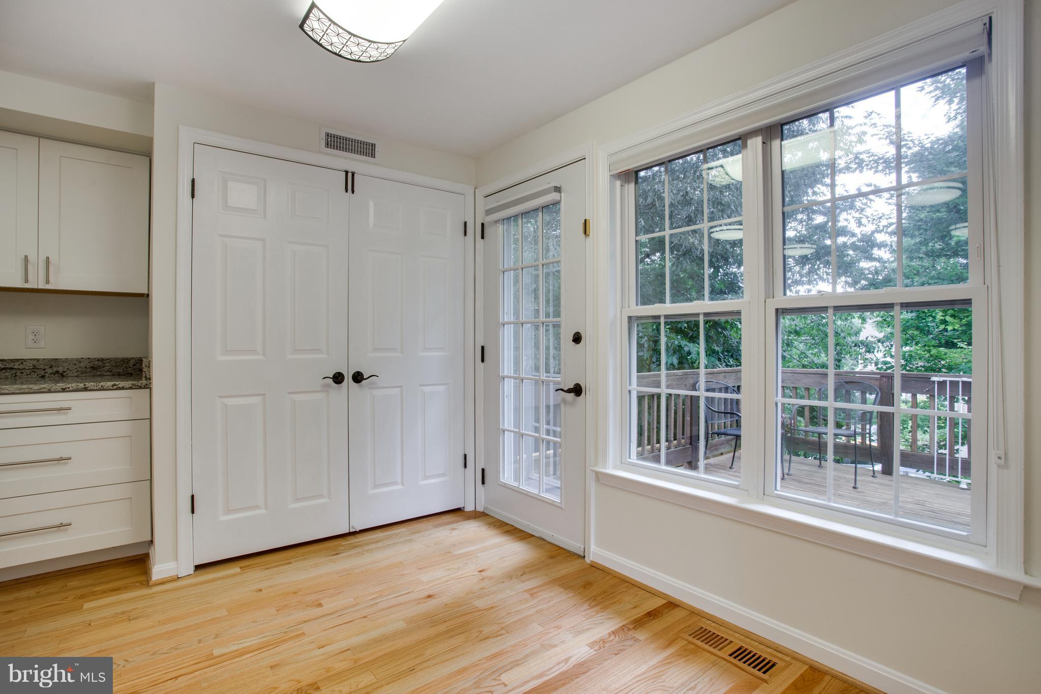 1511 Deer Point Way Reston, VA 20194 - Photo 9 of 30 a view of empty room with wooden floor and fan