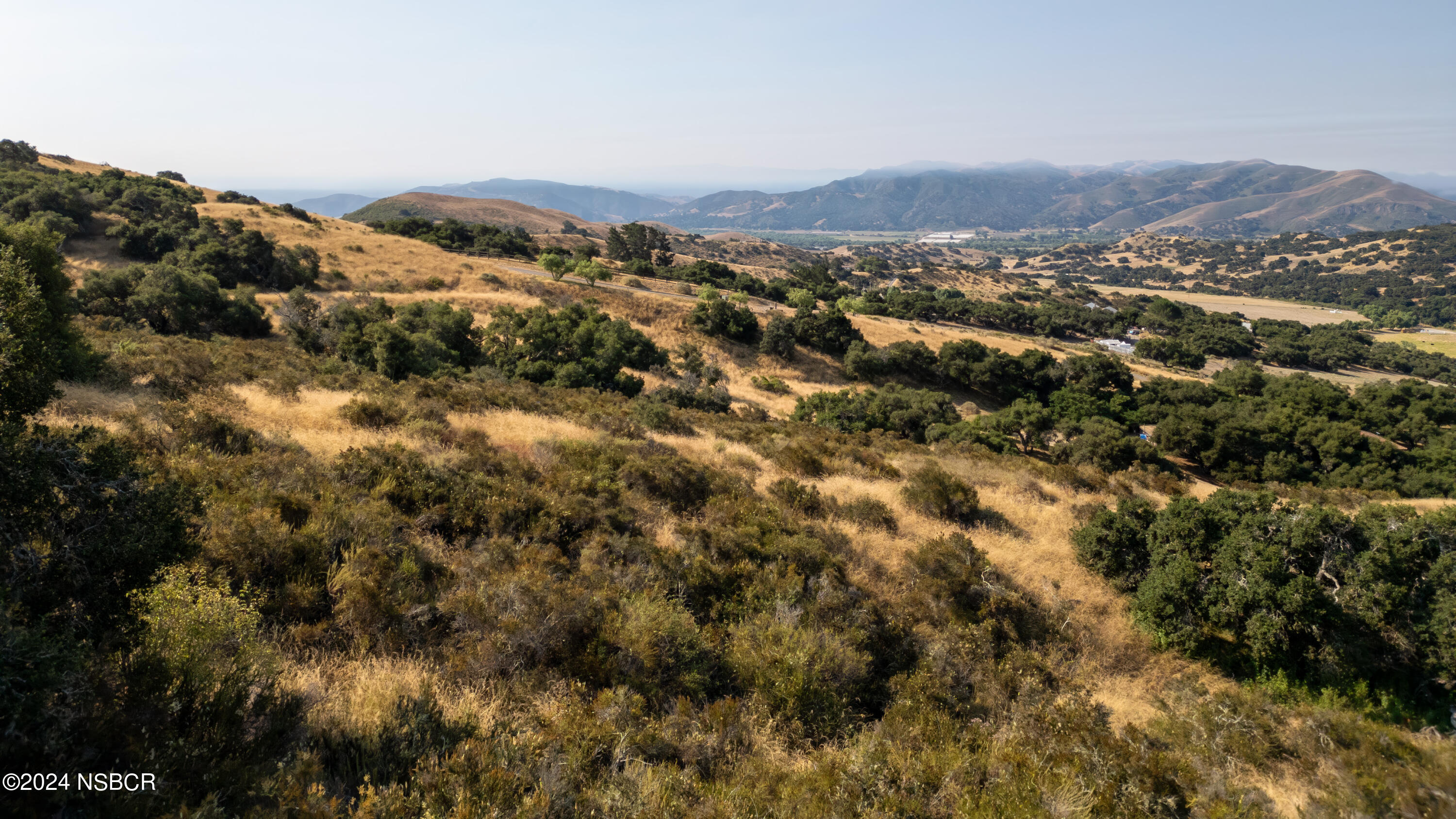 0 Cougar Ridge Road Buellton, CA 93427 - Photo 26 of 27 a view of a city with mountains in the background
