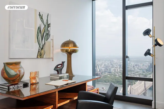 a dining room with furniture and rug floor
