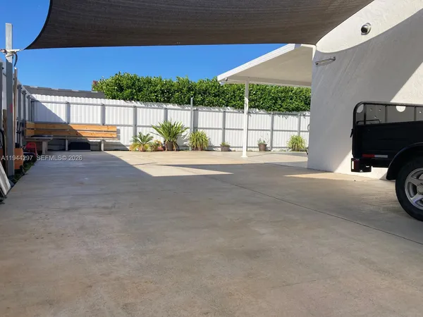 a view of a car park in front of a building