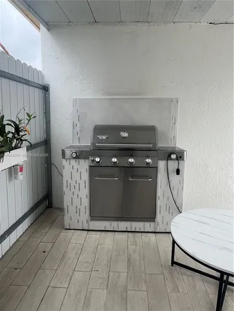 a utility room with washer and dryer