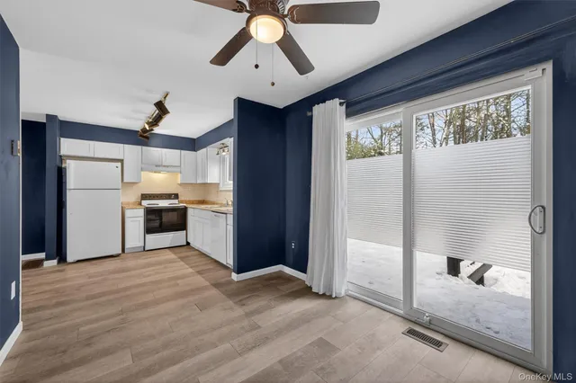 a dining room with a table or chairs and a dining table