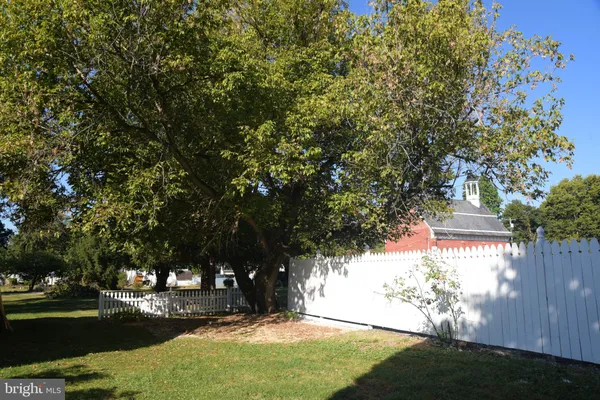a view of backyard with green space