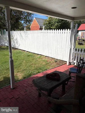a view of a porch with a yard