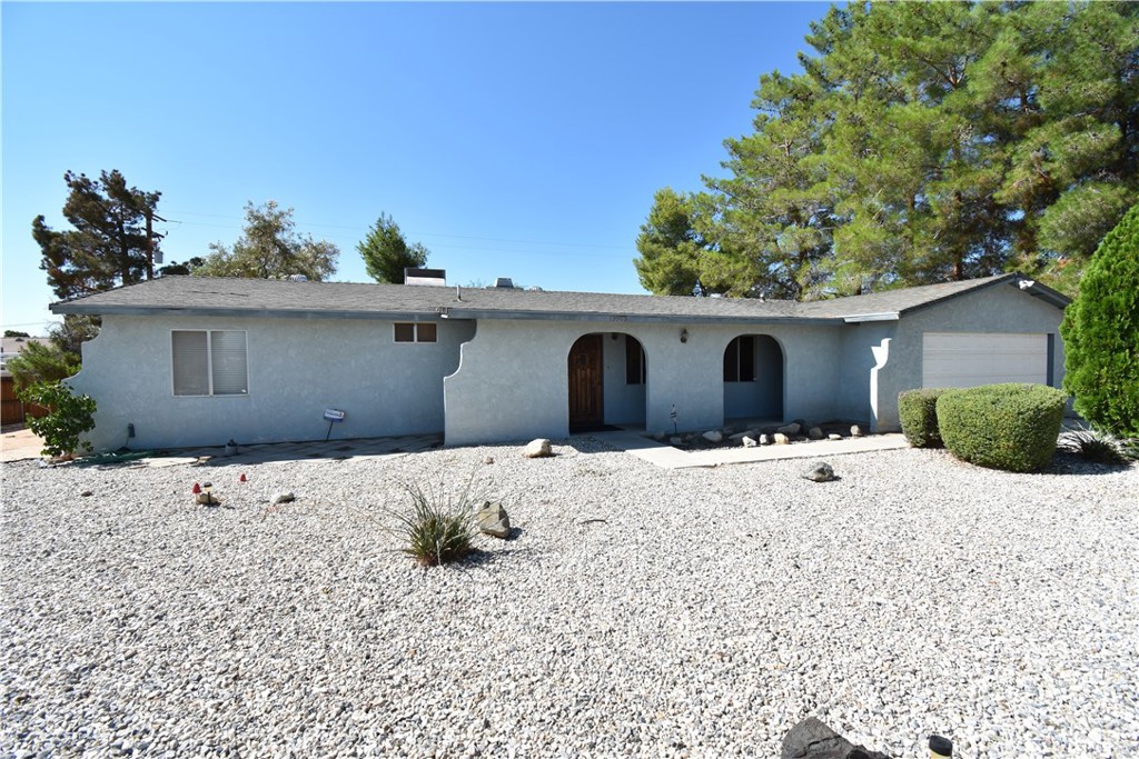 19905 Red Feather Road Apple Valley, CA 92307 - Photo 1 of 1 a house view with a outdoor space
