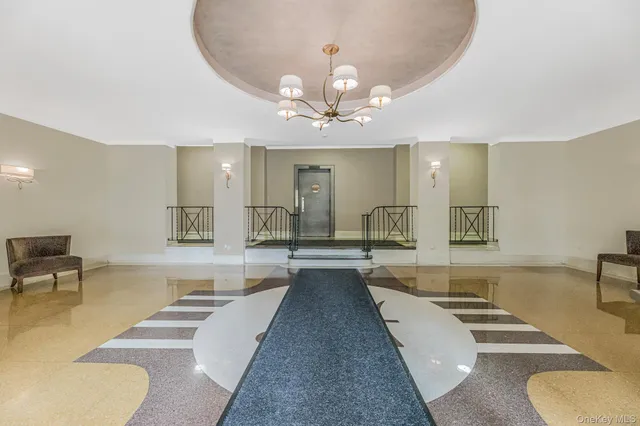 a view of a living room and kitchen