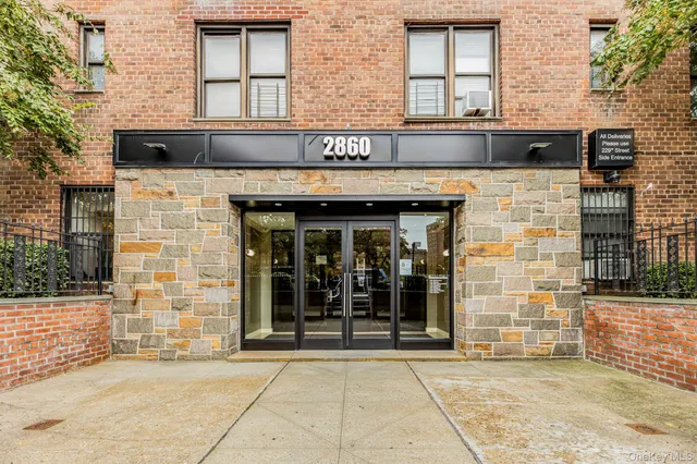a view of a brick building with a entrance door