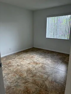 an empty room with a window