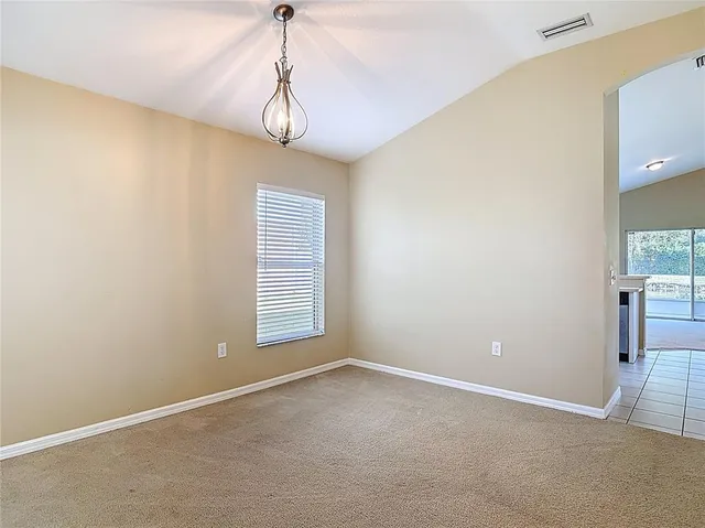 a kitchen with a sink and a window